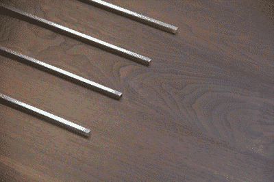 Linear Trivets on Wood Countertop